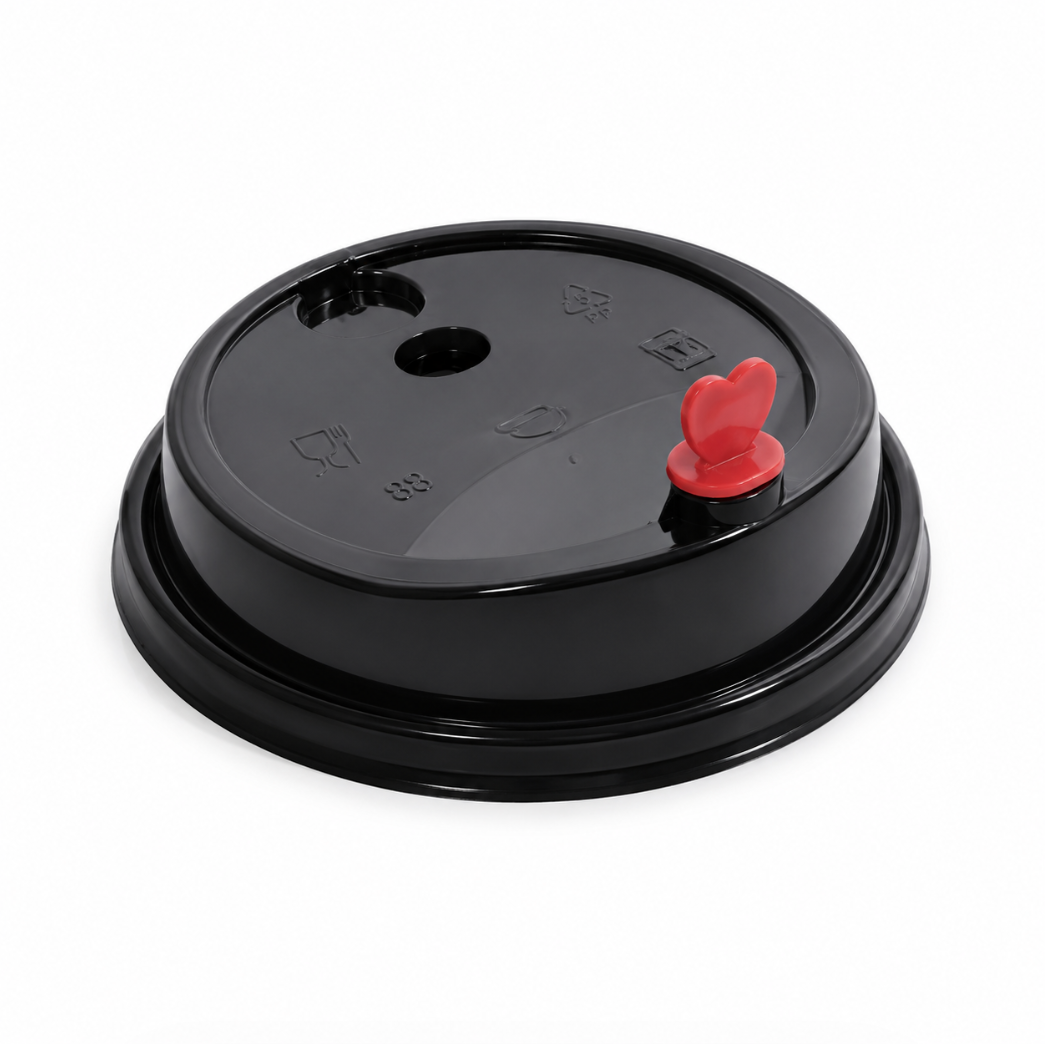Black coffee cup lid with red stopper